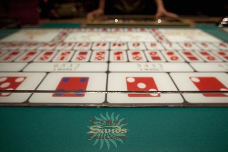 A logo of Sands is seen on a gaming table inside a casino on the opening day of the Sheraton Macao hotel at Sands Cotai Central in Macau Sep A logo of Sands is seen on a gaming table inside a casino on the opening day of the Sheraton Macao hotel at Sands Cotai Central in Macau Sep