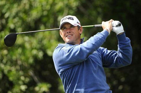 Lee Westwood of Britain hits his tee shot on the 3rd hole during the third round of play in the Honda Classic PGA golf tournament in Palm Be Lee Westwood of Britain hits his tee shot on the 3rd hole during the third round of play in the Honda Classic PGA golf tournament in Palm Be