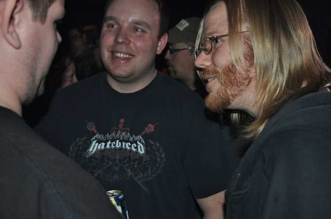 Terry Stevens talking with members of Rock Nation