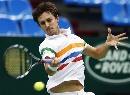 France's Edouard Roger-Vasselin hits a return against Ukraine's Alexandr Dolgopolov during their Kremlin Cup tennis match in Moscow October France's Edouard Roger-Vasselin hits a return against Ukraine's Alexandr Dolgopolov during their Kremlin Cup tennis match in Moscow October
