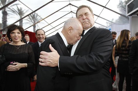 Actors John Goodman (R) and Alan Arkin from "Argo" embrace at the 19th annual Screen Actors Guild Awards in Los Angeles, California in this Actors John Goodman (R) and Alan Arkin from "Argo" embrace at the 19th annual Screen Actors Guild Awards in Los Angeles, California in this