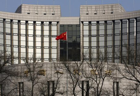 A Chinese national flag is seen at the headquarters of the central bank of China in Beijing February 20, 2013. REUTERS/Kim Kyung-Hoon A Chinese national flag is seen at the headquarters of the central bank of China in Beijing February 20, 2013. REUTERS/Kim Kyung-Hoon