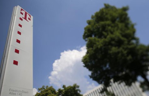 The logo of Deutsche Telekom AG is seen outside the company's headquarter in Bonn May 24, 2012. REUTERS/Wolfgang Rattay The logo of Deutsche Telekom AG is seen outside the company's headquarter in Bonn May 24, 2012. REUTERS/Wolfgang Rattay