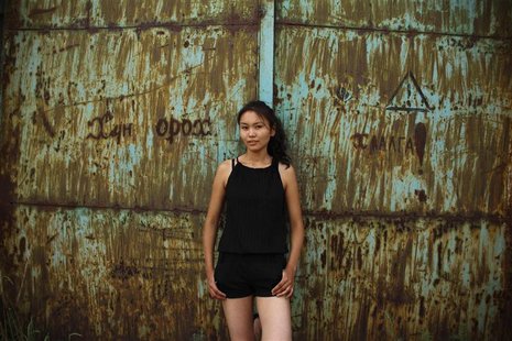 Mongolian singer Gennie, 26, a cast member in the documentary "Mongolian Bling", poses for a photo at an undisclosed location in this pictur Mongolian singer Gennie, 26, a cast member in the documentary "Mongolian Bling", poses for a photo at an undisclosed location in this pictur