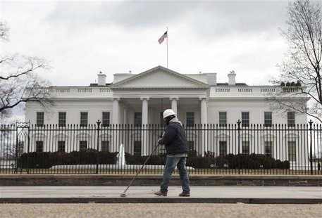 A worker cleans a sidewalk outside the White House in Washington March 2, 2013. REUTERS/Yuri Gripas A worker cleans a sidewalk outside the White House in Washington March 2, 2013. REUTERS/Yuri Gripas