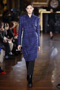 A model presents a creation by British designer Stella McCartney as part of her Fall-Winter 2013/2014 women's ready-to-wear fashion show dur A model presents a creation by British designer Stella McCartney as part of her Fall-Winter 2013/2014 women's ready-to-wear fashion show dur