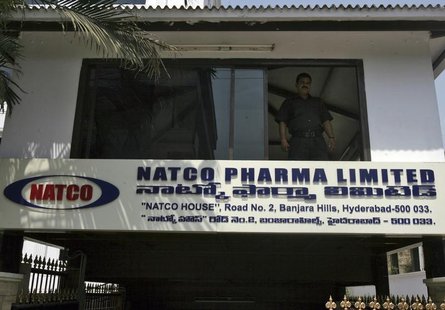 A private security guard looks out from a window of the head office of Natco in the southern Indian city of Hyderabad March 13, 2012. REUTER A private security guard looks out from a window of the head office of Natco in the southern Indian city of Hyderabad March 13, 2012. REUTER
