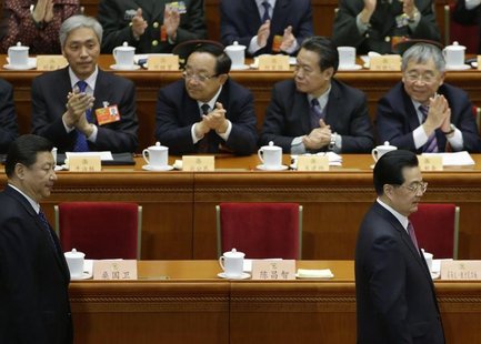 China's President Hu Jintao and China's Communist Party Chief Xi Jinping arrive for the opening ceremony of Chinese People's Political Consu China's President Hu Jintao and China's Communist Party Chief Xi Jinping arrive for the opening ceremony of Chinese People's Political Consu