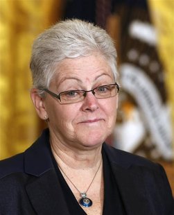 Nominee for Environmental Protection Agency Administrator Gina McCarthy listens to U.S. President Barack Obama in the East Room of the White Nominee for Environmental Protection Agency Administrator Gina McCarthy listens to U.S. President Barack Obama in the East Room of the White