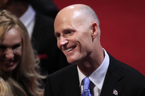 Florida Governor Rick Scott greets an attendee in the audience before the start of the final U.S. presidential debate in Boca Raton, Florida Florida Governor Rick Scott greets an attendee in the audience before the start of the final U.S. presidential debate in Boca Raton, Florida