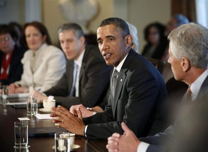 U.S. President Barack Obama participates in his first cabinet meeting of his second term in the Cabinet Room of the White House in Washingto U.S. President Barack Obama participates in his first cabinet meeting of his second term in the Cabinet Room of the White House in Washingto