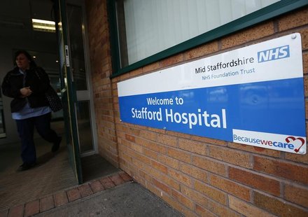 A woman leaves the Stafford Hospital in central England February 6, 2013. REUTERS/Darren Staples A woman leaves the Stafford Hospital in central England February 6, 2013. REUTERS/Darren Staples