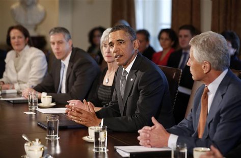 U.S. President Barack Obama participates in the first cabinet meeting of his second term in the Cabinet Room of the White House in Washingto U.S. President Barack Obama participates in the first cabinet meeting of his second term in the Cabinet Room of the White House in Washingto