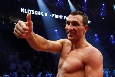 Ukrainian WBO, IBO, IBF and WBA heavyweight boxing world champion Vladimir Klitschko gestures as he celebrates his victory over Polish chall Ukrainian WBO, IBO, IBF and WBA heavyweight boxing world champion Vladimir Klitschko gestures as he celebrates his victory over Polish chall