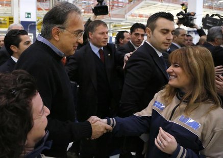 Italian car maker Fiat's Chief Executive Sergio Marchionne shakes the hands of employees during the Maserati new opening plant in Turin, Jan Italian car maker Fiat's Chief Executive Sergio Marchionne shakes the hands of employees during the Maserati new opening plant in Turin, Jan