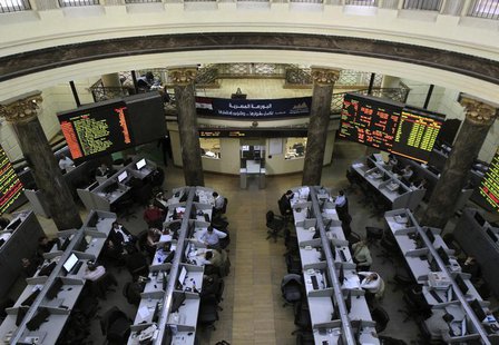 Traders work at the Egyptian stock exchange in Cairo January 22, 2013. REUTERS/Mohamed Abd El Ghany Traders work at the Egyptian stock exchange in Cairo January 22, 2013. REUTERS/Mohamed Abd El Ghany