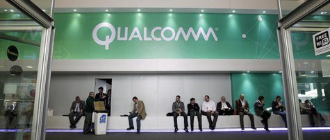 People sit next a Qualcomm stand at the Mobile World Congress at Barcelona, February 27, 2013. REUTERS/Albert Gea People sit next a Qualcomm stand at the Mobile World Congress at Barcelona, February 27, 2013. REUTERS/Albert Gea