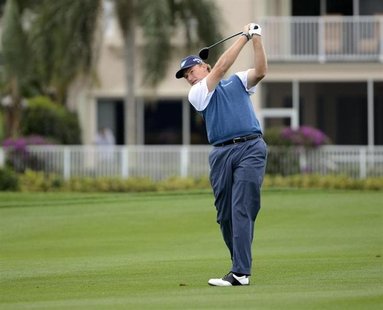 Ernie Els of South Africa hits the ball on the 18th green during second round play in the Honda Classic PGA golf tournament in Palm Beach Ga Ernie Els of South Africa hits the ball on the 18th green during second round play in the Honda Classic PGA golf tournament in Palm Beach Ga