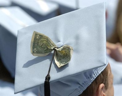 Graduates celebrate receiving a Masters in Business Administration from Columbia University during the year's commencement ceremony in New Y Graduates celebrate receiving a Masters in Business Administration from Columbia University during the year's commencement ceremony in New Y