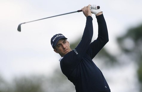Australia's Geoff Ogilvy tees off on the 7th hole in final round play at the Honda Classic PGA golf tournament in Palm Beach Gardens, Florid Australia's Geoff Ogilvy tees off on the 7th hole in final round play at the Honda Classic PGA golf tournament in Palm Beach Gardens, Florid