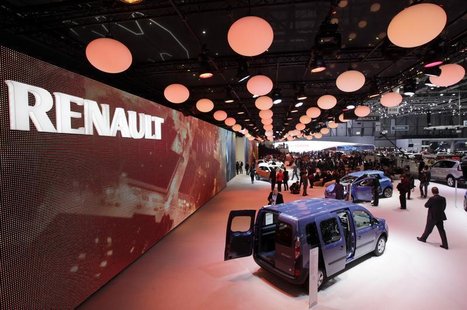Visitors walk around the exhibition stand of Renault during the first media day of the Geneva Auto Show at the Palexpo in Geneva March 5, 20 Visitors walk around the exhibition stand of Renault during the first media day of the Geneva Auto Show at the Palexpo in Geneva March 5, 20
