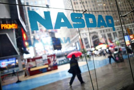 Pedestrians walk past the NASDAQ MarketSite in New York's Times Square in this June 4, 2012 file photo. REUTERS/Eric Thayer/Files Pedestrians walk past the NASDAQ MarketSite in New York's Times Square in this June 4, 2012 file photo. REUTERS/Eric Thayer/Files