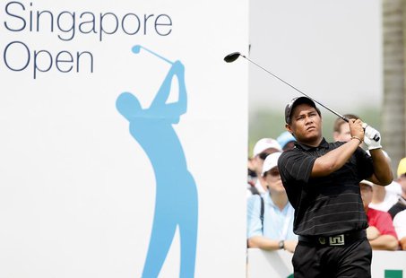 Thailand's Chapchai Nirat tees off on the ninth hole during the final round of the Singapore Open golf tournament November 16, 2008. REUTERS Thailand's Chapchai Nirat tees off on the ninth hole during the final round of the Singapore Open golf tournament November 16, 2008. REUTERS