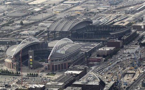 This aerial view looking south shows the cluster of Seattle's current NFL and MLB professional sports stadiums and also the adjacent locatio This aerial view looking south shows the cluster of Seattle's current NFL and MLB professional sports stadiums and also the adjacent locatio