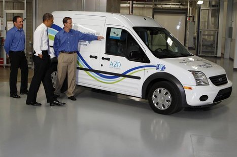 U.S. President Barack Obama looks at an electric car as he tours an advanced battery facility, Johnson Controls, Inc. in Holland, Michigan, U.S. President Barack Obama looks at an electric car as he tours an advanced battery facility, Johnson Controls, Inc. in Holland, Michigan,