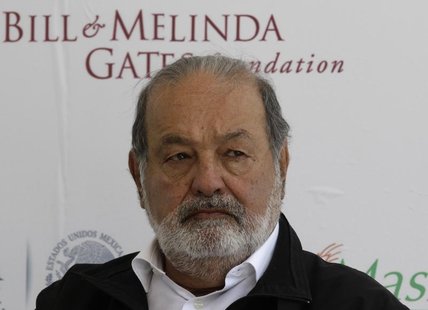 Mexican businessman Carlos Slim listens during a news conference after the inauguration of a new research facility at the International Maiz Mexican businessman Carlos Slim listens during a news conference after the inauguration of a new research facility at the International Maiz