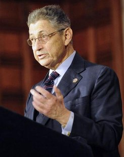 Assembly Speaker Sheldon Silver applauds New York Governor Andrew Cuomo after the New York Secure Ammunition and Firearms Enforcement Act wa Assembly Speaker Sheldon Silver applauds New York Governor Andrew Cuomo after the New York Secure Ammunition and Firearms Enforcement Act wa