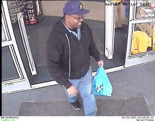 This surveillance photo shows a man Neenah police suspect of breaking into YMCA lockers. This surveillance photo shows a man Neenah police suspect of breaking into YMCA lockers.
