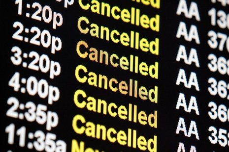 American Airlines cancellations are shown on monitors at Chicago's O'Hare International Airport.(Reuters photo) American Airlines cancellations are shown on monitors at Chicago's O'Hare International Airport.(Reuters photo)