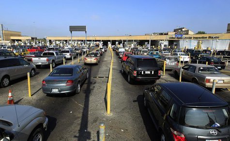 Motorists wait in lanes of traffic heading into the United States from Mexico at the U.S. border crossing in San Ysidro, California Septembe Motorists wait in lanes of traffic heading into the United States from Mexico at the U.S. border crossing in San Ysidro, California Septembe