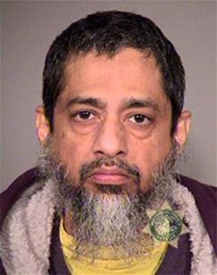 Reaz Qadir Khan, 48, a naturalized U.S. citizen, is seen in this undated handout photo provided by the U.S. Marshall Service. REUTERS/U.S. M Reaz Qadir Khan, 48, a naturalized U.S. citizen, is seen in this undated handout photo provided by the U.S. Marshall Service. REUTERS/U.S. M