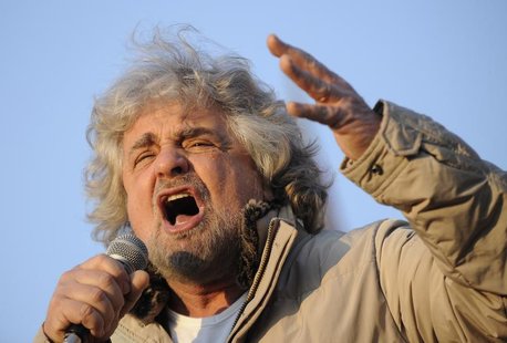 Five-Star Movement leader and comedian Beppe Grillo gestures during a rally in Turin February 16, 2013. REUTERS/Giorgio Perottino Five-Star Movement leader and comedian Beppe Grillo gestures during a rally in Turin February 16, 2013. REUTERS/Giorgio Perottino