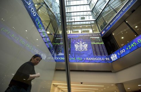 Electronic information boards display market information at the London Stock Exchange in the City of London January 2, 2013. REUTERS/Paul Ha Electronic information boards display market information at the London Stock Exchange in the City of London January 2, 2013. REUTERS/Paul Ha