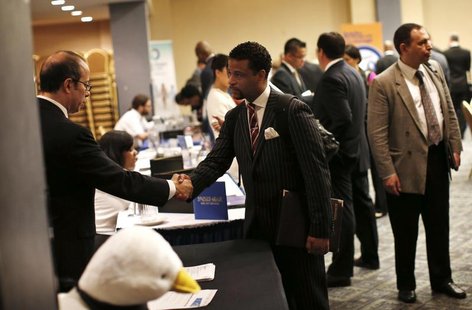 A job seeker (R) meets with a prospective employer at a career fair in New York City, October 24, 2012. REUTERS/Mike Segar A job seeker (R) meets with a prospective employer at a career fair in New York City, October 24, 2012. REUTERS/Mike Segar