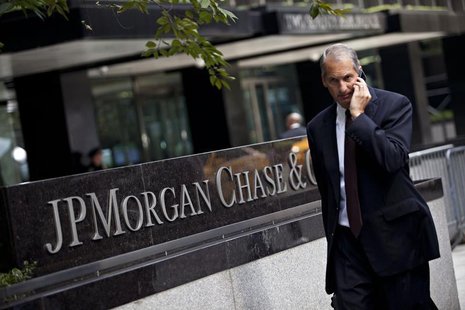 A man walks past JP Morgan Chase's international headquarters on Park Avenue in New York July 13, 2012. REUTERS/Andrew Burton A man walks past JP Morgan Chase's international headquarters on Park Avenue in New York July 13, 2012. REUTERS/Andrew Burton
