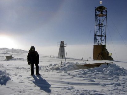 A man stands near drilling apparatus at the Vostock research camp in Antarctica in this January 13, 2006 handout photograph. REUTERS/Alexey A man stands near drilling apparatus at the Vostock research camp in Antarctica in this January 13, 2006 handout photograph. REUTERS/Alexey