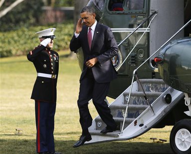 U.S. President Barack Obama salutes as he steps off Marine One at the White House in Washington after visiting wounded military personnel at U.S. President Barack Obama salutes as he steps off Marine One at the White House in Washington after visiting wounded military personnel at
