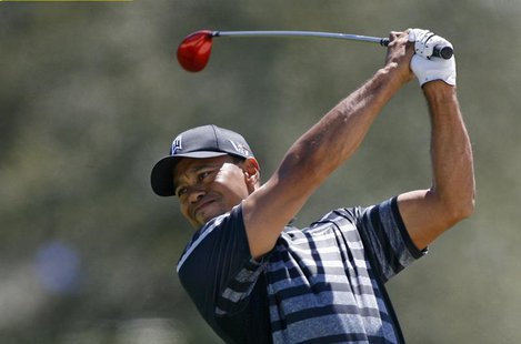Tiger Woods of the U.S. hits from the 12th fairway during first round play in the 2013 WGC-Cadillac Championship PGA golf tournament in Dora Tiger Woods of the U.S. hits from the 12th fairway during first round play in the 2013 WGC-Cadillac Championship PGA golf tournament in Dora