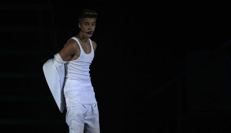 Canadian singer Justin Bieber performs in a concert at the Manchester Arena in Manchester, northern England, February 21, 2013. REUTERS/Phil Canadian singer Justin Bieber performs in a concert at the Manchester Arena in Manchester, northern England, February 21, 2013. REUTERS/Phil