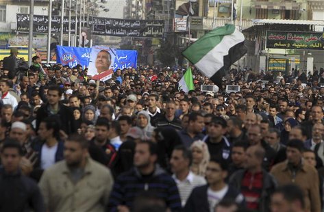 People against Egyptian President Mohamed Mursi attend the funeral of Ahmed Galal, who died during clashes between police and demonstrators, People against Egyptian President Mohamed Mursi attend the funeral of Ahmed Galal, who died during clashes between police and demonstrators,