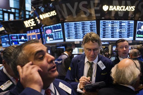 Traders work on the floor at the New York Stock Exchange just after the opening bell, March 8, 2013. REUTERS/Lucas Jackson Traders work on the floor at the New York Stock Exchange just after the opening bell, March 8, 2013. REUTERS/Lucas Jackson