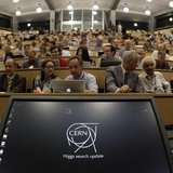 A computer screen is pictured before a scientific seminar to deliver the latest update in the search for the Higgs boson at the European Org A computer screen is pictured before a scientific seminar to deliver the latest update in the search for the Higgs boson at the European Org