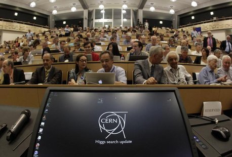 A computer screen is pictured before a scientific seminar to deliver the latest update in the search for the Higgs boson at the European Org A computer screen is pictured before a scientific seminar to deliver the latest update in the search for the Higgs boson at the European Org
