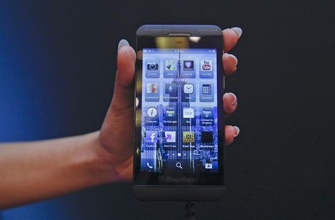 A BlackBerry salesperson displays a BlackBerry Z10 during the launch of the BlackBerry 10 smartphone in Mumbai February 25, 2013. REUTERS/Vi A BlackBerry salesperson displays a BlackBerry Z10 during the launch of the BlackBerry 10 smartphone in Mumbai February 25, 2013. REUTERS/Vi