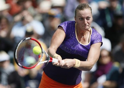 Petra Kvitova of the Czech Republic returns a shot against Olga Govortsova of Belarus during their match at the BNP Paribas Open WTA tennis Petra Kvitova of the Czech Republic returns a shot against Olga Govortsova of Belarus during their match at the BNP Paribas Open WTA tennis