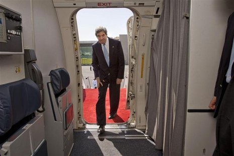 U.S. Secretary of State John Kerryn boards his aircraft to return to Washington at the airport in Doha, March 6, 2013. REUTERS/Jacquelyn Mar U.S. Secretary of State John Kerryn boards his aircraft to return to Washington at the airport in Doha, March 6, 2013. REUTERS/Jacquelyn Mar
